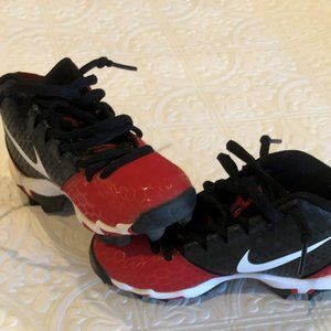 Nike Kid's Cleats in red and black with white swoosh, size 10C